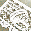 Personalized papel picado by Ay Mujer. This original design features 2 wedding rings and a custom message.