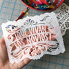 Papel picado in hand, by Ay Mujer